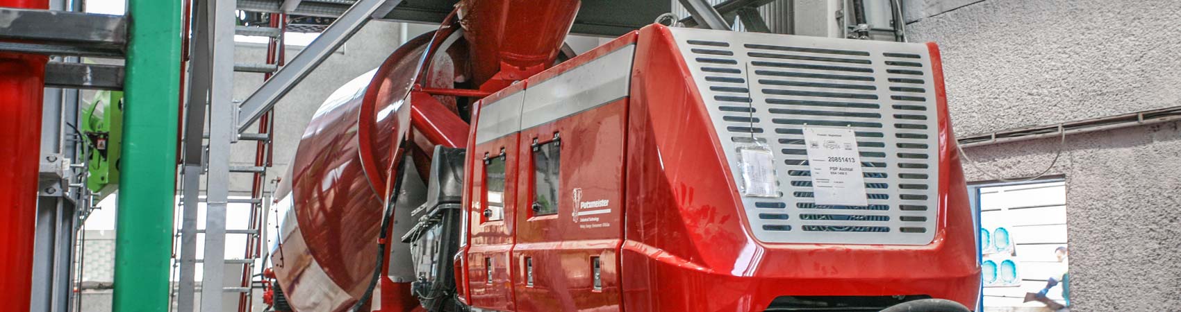 Stationary Concrete Pump with Buffer Storage in a precast factory